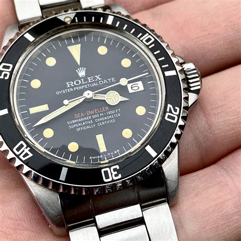 rolex and black and red dive watch|rolex dive watch side profile.